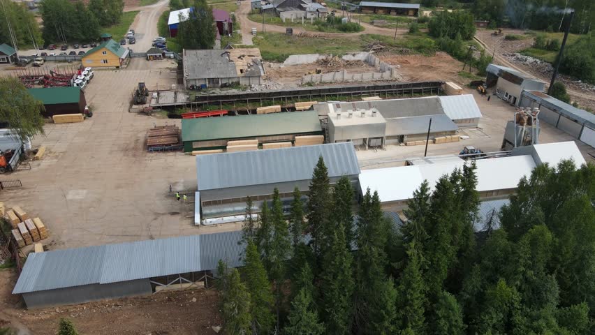 Sawmill near forest in countryside in summer