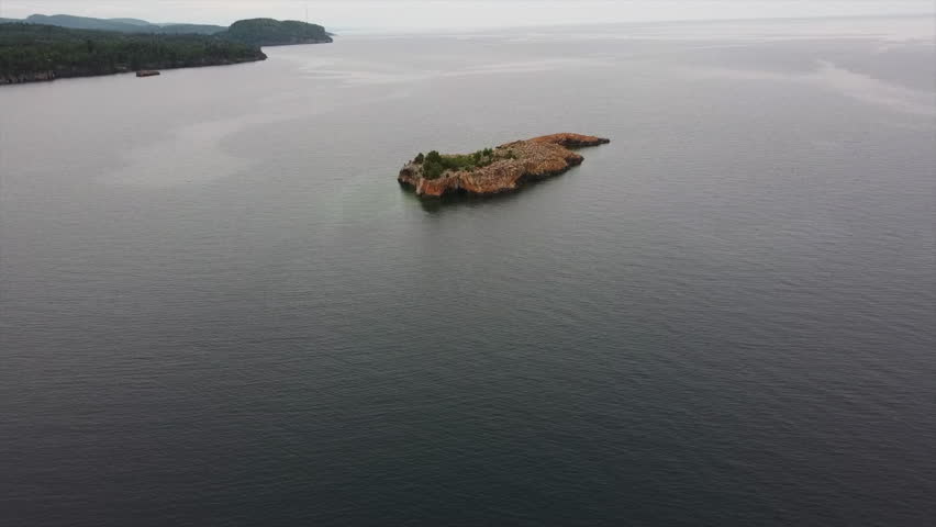 Drone POV Small Island in Lake Superior, Black Beach, North Shore, Minnesota