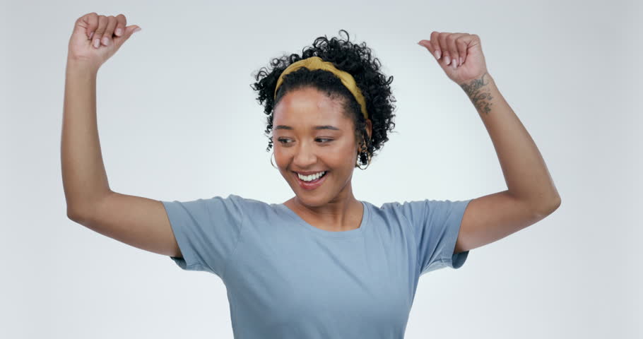 Face, woman and dance for success in studio with freedom, celebrate party and winning lottery bonus. Portrait, happy model and dancing for celebration, energy and excited music on white background