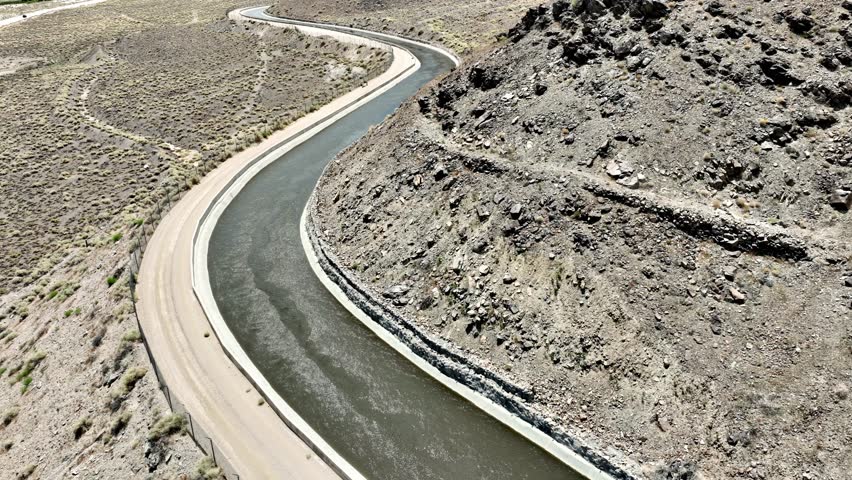 Aerial shot of the Los Angeles Aqueduct running through Owen’s Valley at the base of the Sierra Nevada Mountains in California. The aqueduct supplies water to Los Angeles and Southern California.