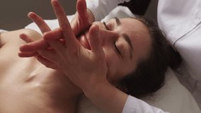 Beautiful woman enjoying facial massage with closed eyes at spa salon. Healthy body care. Therapy treatment, beauty skin care. Face treatment. Body massage - Powered by Shutterstock - Get 15% off with code: PIKWIZARD15