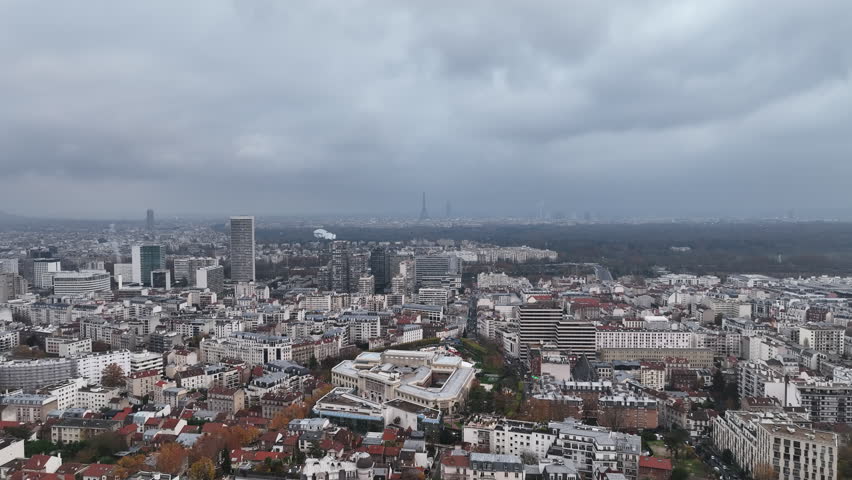 From above, La Défense's skyline is a striking contrast to the clouds.
 Royalty-Free Stock Footage #1108680609