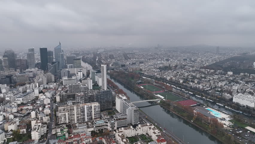 Paris's financial quarter, La Défense, enveloped in a cloudy ambiance.
 Royalty-Free Stock Footage #1108680617