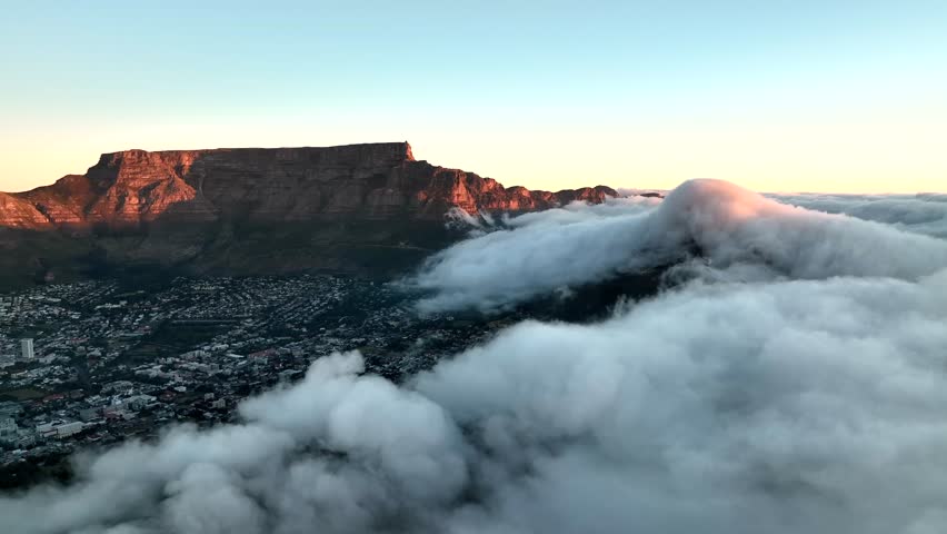 Aerial view of Cape Town residential district with low clouds fog from Signal Hill, Cape Town, South Africa.