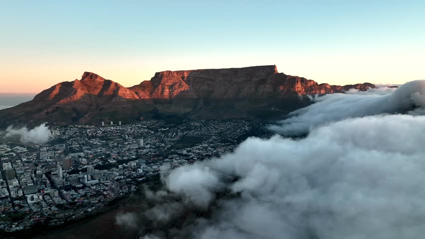 Aerial view of Cape Town residential district with low clouds fog from Signal Hill, Cape Town, South Africa.