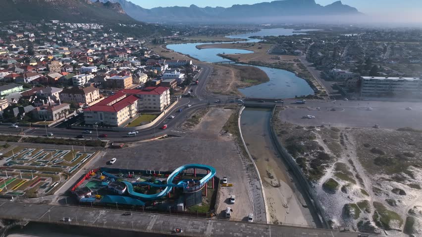 Aerial view of a small town along the river near Muizenberg Beach, Cape Town, South Africa.