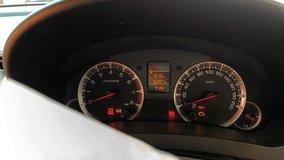 4K Video : Seat belt indication in car speedometer. 