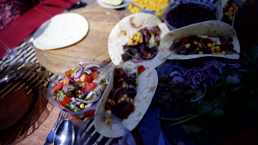 Tasty Mexican Tacos Filled Meat. Homemade American Soft Shell Beef Tacos. Mexican Food Burrito. Tortilla Fast Food. Mexican Pork Carnitas Tacos Fajitas. American Taco Salsa Corn Tortilla Carne Asada