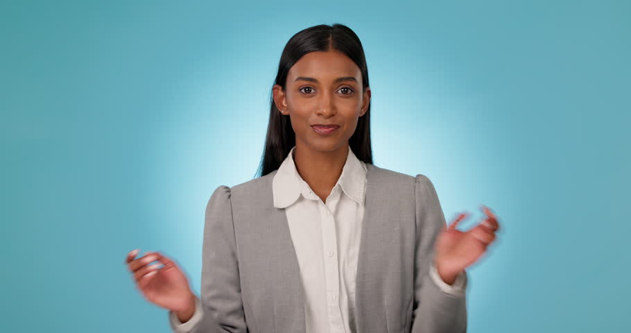 Business woman, arms crossed and portrait in studio with confidence and pride for career in law. Face of a indian person or professional lawyer with a smile, positive attitude and blue background Royalty-Free Stock Footage #1108704271