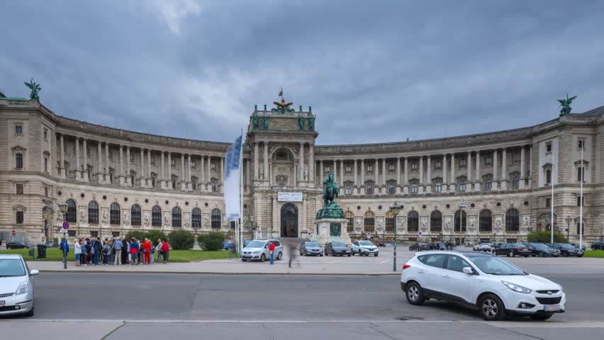 Vienna, Austria. Hofburg Palace. Neue Burg Vienna Austria timelapse from day to night. in 4K, Wien Ostereich neue burg lapse.  Imperial Palace Hofburg and Statue of Prince Eugene of Savoy, Vienna Wien