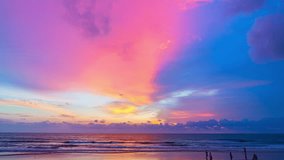 colorful light through to the cloud above the ocean.
Clouds are moving slowly in stunning sunset video 4K. Nature video High quality footage 
Scene of Colorful romantic sky sunset background.
