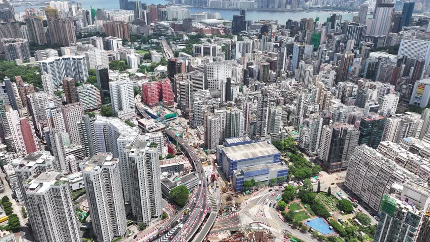 Drone aerial shot city Skyview in Nathan Road Tsim Sha Tsui Mong Kok Jordan Austin Yau Ma Tei Central Hong Kong , a commercial hub with the financial of the Victoria Harbour Royalty-Free Stock Footage #1108712939