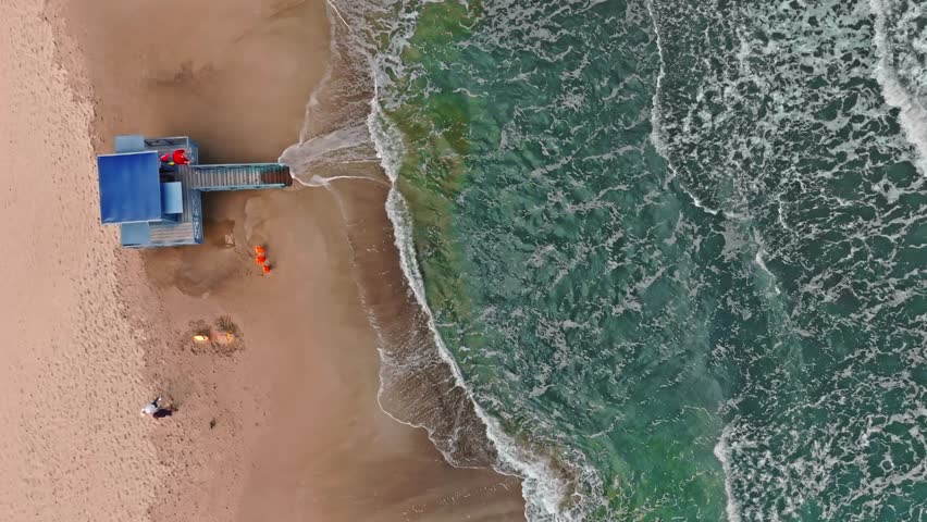 Top down view of lifeguard tower flooded by Baltic Sea, Poland. Aerial view of Baltic sea after storm. Royalty-Free Stock Footage #1108718503