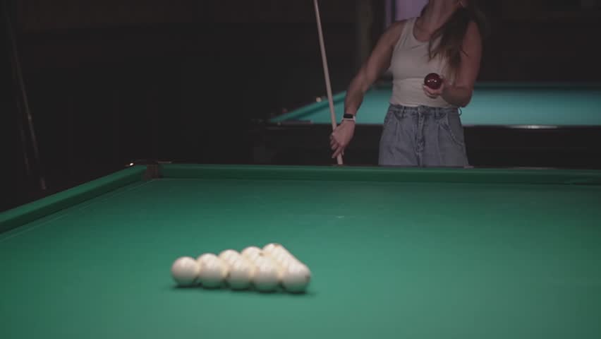 Woman and billiard ball. a woman plays Russian billiards. slow motion video. Record high quality video in Full HD format. | Shutterstock HD Video #1108728719