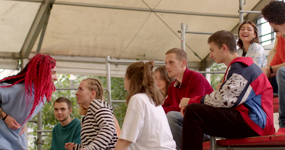 Dance master class at summer camp. Young girl shows dance moves in dance theory group class. Instructor focus on technique, choreography style and performance. `Group of young people, happy lifestyle 