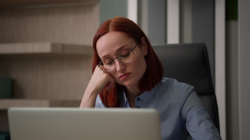 Lazy boring female manager at company corporate workplace unmotivated businesswoman in office Caucasian girl woman business entrepreneur bad worker lady employer work with laptop computer bored task Royalty-Free Stock Footage #1108752819