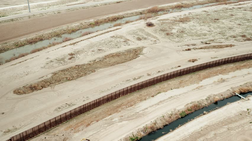 Aerial shot of the international border between USA and Mexico
