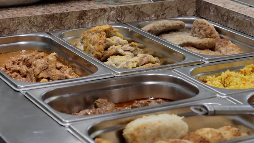 Patches with food on the bistro counter, meat and garnish in patches. Fast food bistro, low income charity kitchen, food stand. | Shutterstock HD Video #1108760099