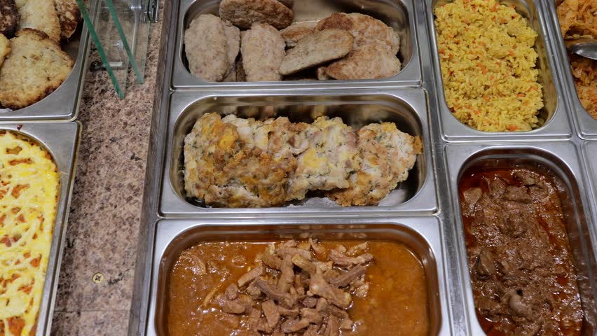 Patches with food on the bistro counter, meat and garnish in patches. Fast food bistro, low income charity kitchen, food stand. | Shutterstock HD Video #1108760117