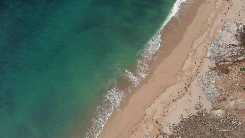 Untouched landscape in Big Sur, aerial of Bixby Creek Bridge, shrouded in fog