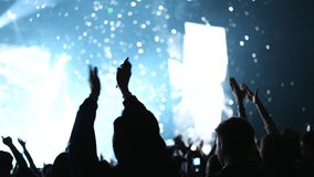 Cheer man fan hang out. Fun guy enjoy music concert. Epic neon glow light party. Cool dj live show. People clap night club hip hop fest. K pop event applaud. Joy rock roll rave. Crowd raise hand up. - Powered by Shutterstock - Get 15% off with code: PIKWIZARD15