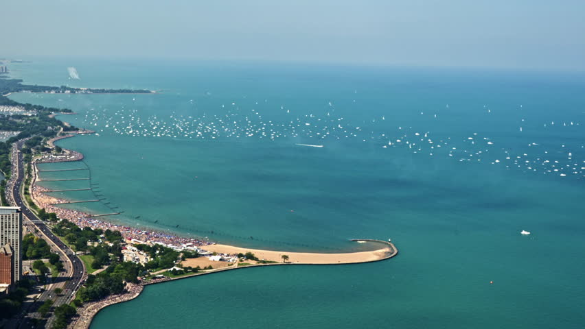 U.S. Air Force Thunderbirds flying on the coast of downtown Chicago, sunny USA