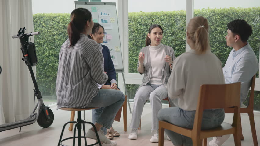 Circle diverse group asia Gen Z people workshop SDGs class learning Go green carbon credit project Future growth Net zero waste working in ESG office. Young asian woman talking in eco friendly meeting | Shutterstock HD Video #1108785575
