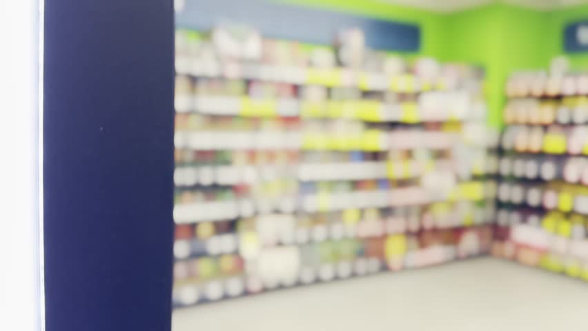 Blurred shelves of a supermarket, grocery store | Shutterstock HD Video #1108787559