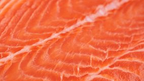 Red fish fillet. Raw salmon fillet texture close up, slider shot