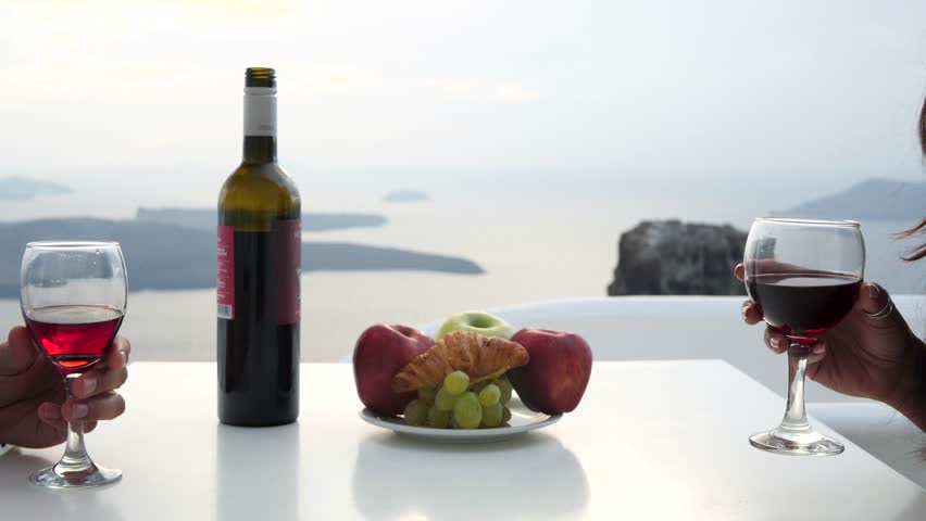 Romantic Couple, Cheers with Red Wine Glass. All Inclusive Resort in Santorini Greece, Romantic Couple Spa Getaway in Paradise. Wine Tasting. Royalty-Free Stock Footage #1108803583