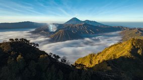 Hyperlapse aerial view flying to mount Bromo active volcano above sea of clouds, Java, Indonesia 
 - Powered by Shutterstock - Get 15% off with code: PIKWIZARD15