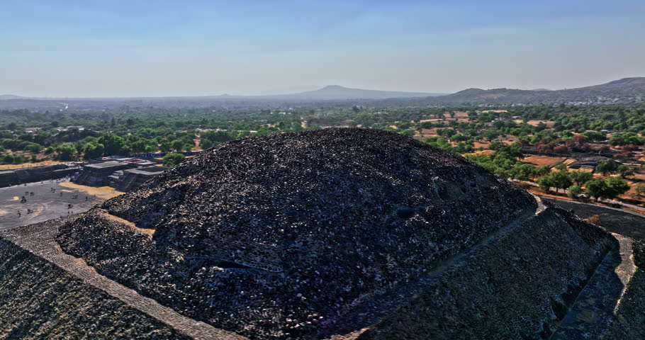 Teotihuacan Mexico Aerial v5 circular pan drone flying close and around the top of pyramid of the moon capturing the magnificent and marvellous stone structure - Shot with Mavic 3 Cine - December 2021