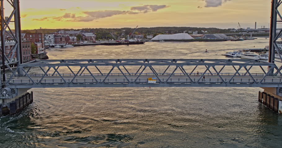 Portsmouth New Hampshire Aerial v15 flyover memorial bridge with sunset in the background, birds eye view overlooking at beautiful downtown cityscape - Shot with Inspire 2, X7 camera - October 2021