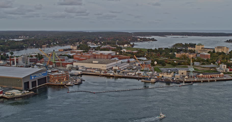 Portsmouth New Hampshire Aerial v9 panoramic view capturing navel shipyard at kittery maine across piscataqua river with downtown cityscape at sunset - Shot with Inspire 2, X7 camera - October 2021