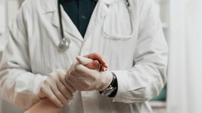 Hospital. Medical professional in doctor's clothes holding doctor's appointment in the doctor's room. General angle doctor gynecologist examines the patient's hand Innovative treatment methods, woman - Powered by Shutterstock - Get 15% off with code: PIKWIZARD15