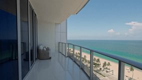 Contemporary Balcony Footage Video located in Florida, USA. Showcasing modern architectural design and development. Beautiful clear sky and commercial area view.