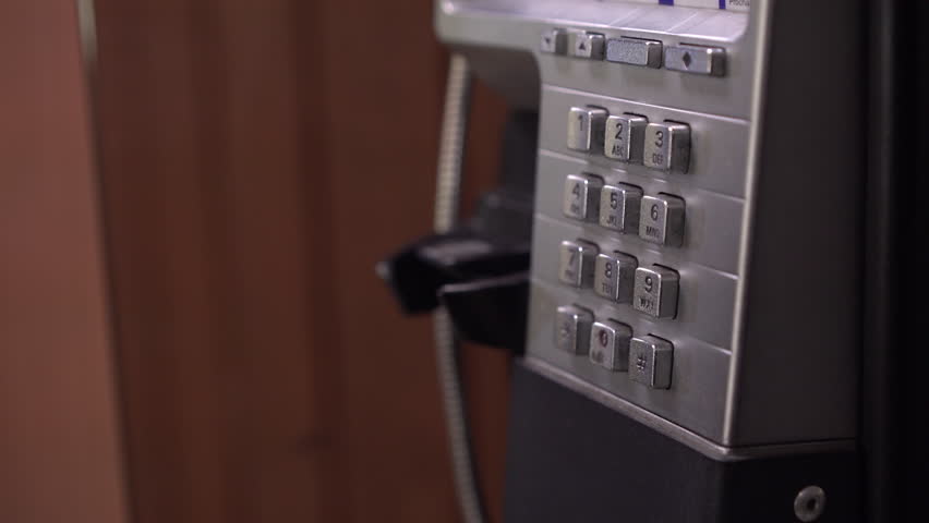 Dialing phone number on public pay phone 4k Royalty-Free Stock Footage #1108819109