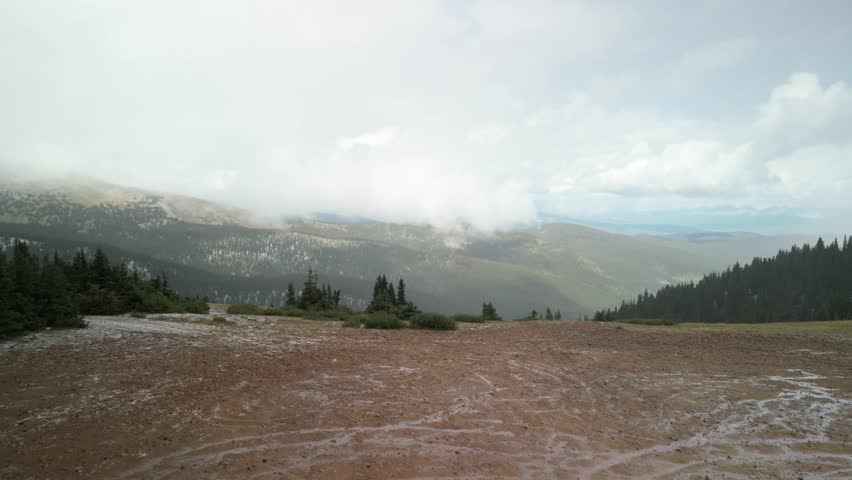 Aerial of frost covered tundra in Gunnison National Forest in Colorado in snow storm