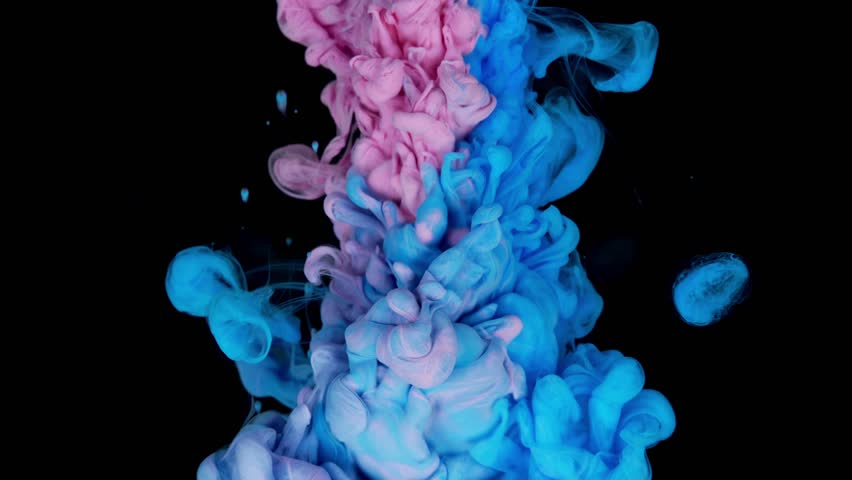 Colorful Pink and Blue ink cloud Mixing and Flowing in Water Isolated on Black