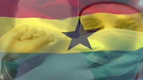 Animation of waving ghana flag against caucasian female surgeon wearing surgical mask at hospital. Medical healthcare and patriotism concept - Powered by Shutterstock - Get 15% off with code: PIKWIZARD15