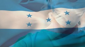 Animation of waving honduras flag against portrait of caucasian female surgeon at hospital. Medical healthcare and patriotism concept - Powered by Shutterstock - Get 15% off with code: PIKWIZARD15