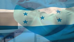 Animation of waving honduras flag against portrait of biracial male surgeon at hospital. Medical healthcare and patriotism concept - Powered by Shutterstock - Get 15% off with code: PIKWIZARD15