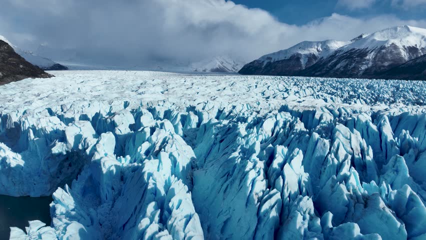 Perito Moreno Glacier At El Calafate Patagonia Argentina. Iceberg El Calafate Patagonia. Idyllic Lake Ranch Snowing Mountain. Idyllic Forest Trees Ranch Lakeshore Nature. Royalty-Free Stock Footage #1108839115
