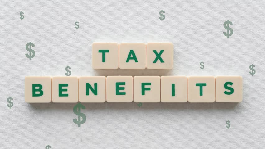 Tax Benefits Text On Small Tiles With Dollar Sign Pull-Up Effect At Background. Royalty-Free Stock Footage #1108844579