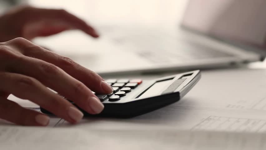 Asian senior woman calculates bills Use calculator to carry out company financial and accounting senior Women hand using calculator on desk Royalty-Free Stock Footage #1108848007