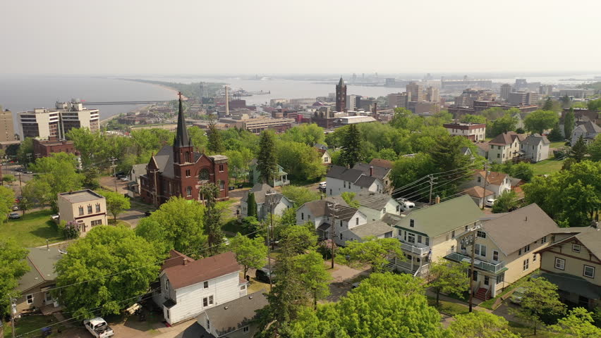 Duluth, Minnesota: Urban cityscape, houses, Midwest USA. Aerial view of vibrant neighborhoods near Lake Superior. Royalty-Free Stock Footage #1108851085
