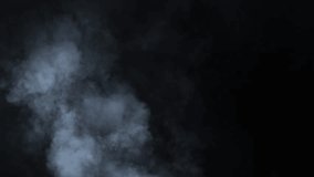 Abstract white smoke in slow motion. Smoke, Cloud of cold fog in light spot background. Light, white, fog, cloud, black background, 4k, ice smoke cloud. Floating fog.