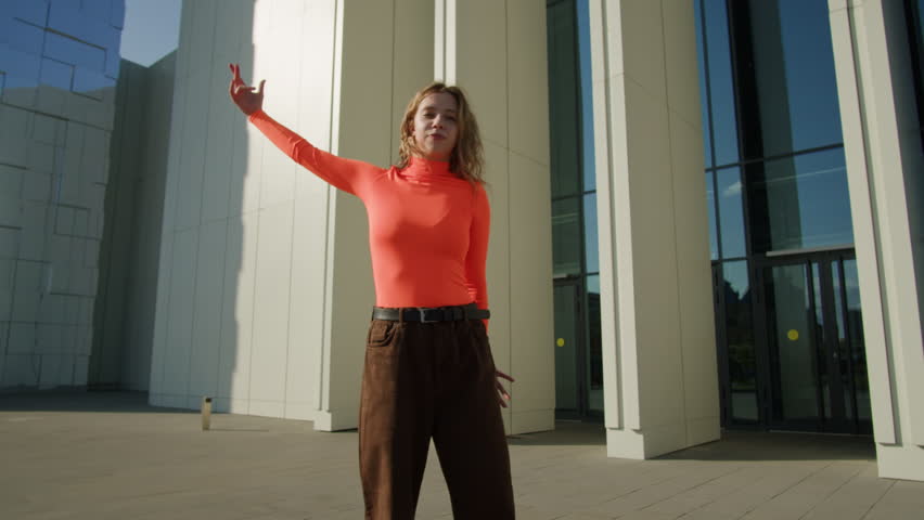 Young woman dancing hip hop elegant dance on high heels. Redhead curly girl dance Modern Jazz Funk choreography. Female professional dancer showing dance movings. Musical video. | Shutterstock HD Video #1108853665