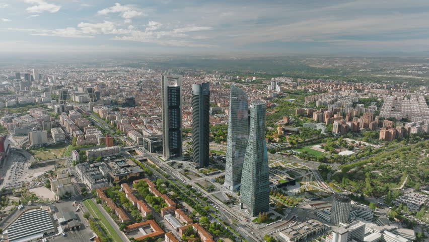 Madrid's finance district, from the sky, paints a picture of Spain's robust economic landscape.
 Royalty-Free Stock Footage #1108853837