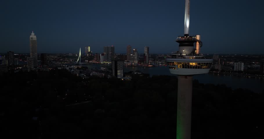 Aerial drone view of the Skyline of Rotterdam, close up at the Euromast observation deck. Metropole in the netherlands, south of holland.